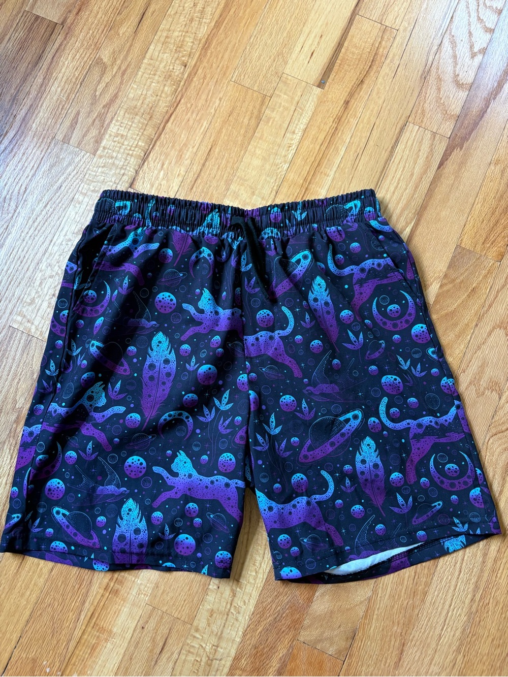 Unisex Black Athletic Shorts with Purple & Teal Space Motif